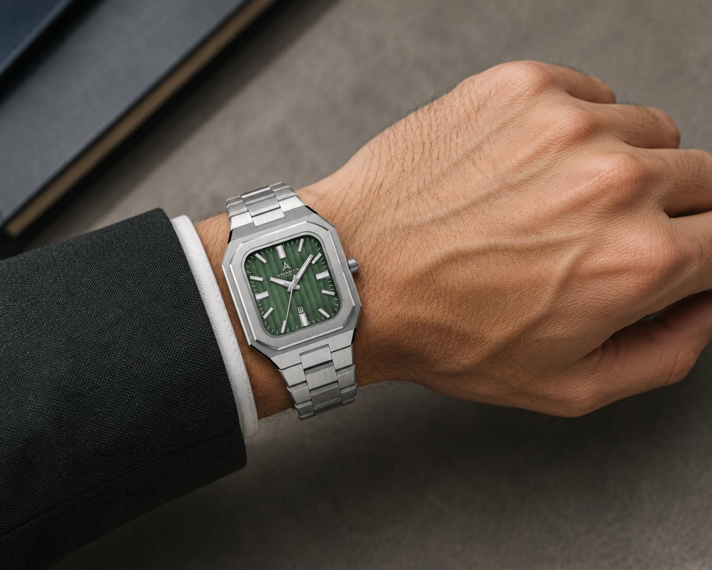 A person wearing an Ariaman & Co watch, showcasing its elegant design.